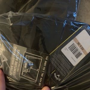 Two pairs of brand new callaway pants size 42x36